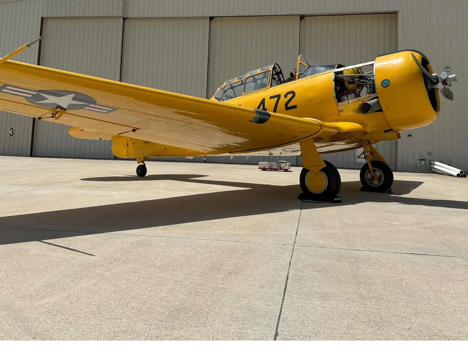 A T-6 Texan in the Alpha Company Aviation hangar